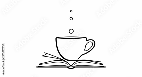 A cup of coffee on a book.