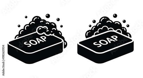 Two bars of soap with bubbles a striking black silhouette