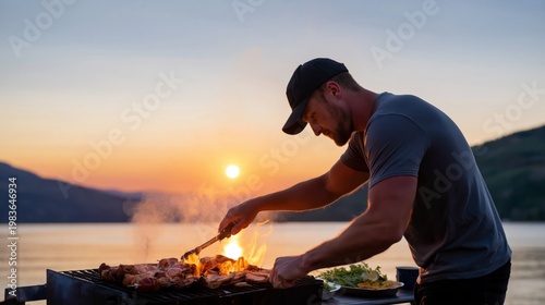 Graduation Ceremony Takes Place at Sunset With a Graduate Looking Toward the ...
