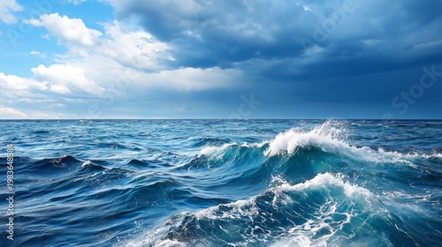 Waves Crash Onto the Shore as Sunlight Reflects on the Ocean During a Clear Day