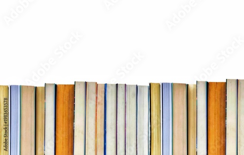 Photo of a row of colorful antique books, isolated on white background with space for text.