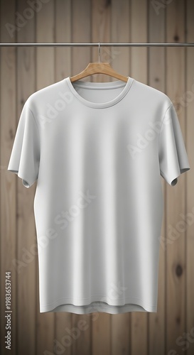 A clean white t-shirt hangs on a wooden hanger against a rustic wooden wall