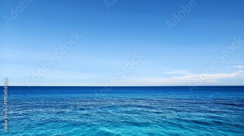 Blue Ocean Under Clear Sky With Calm Water in Daylight Hours Near Coastal Area