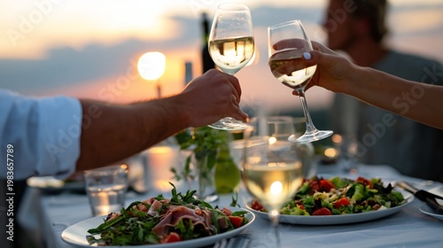 Dinner Party at Sunset Enjoying Food and Drinks With Friends on a Warm Evenin...