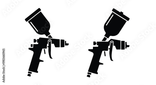Two spray guns depicted in a striking black silhouette