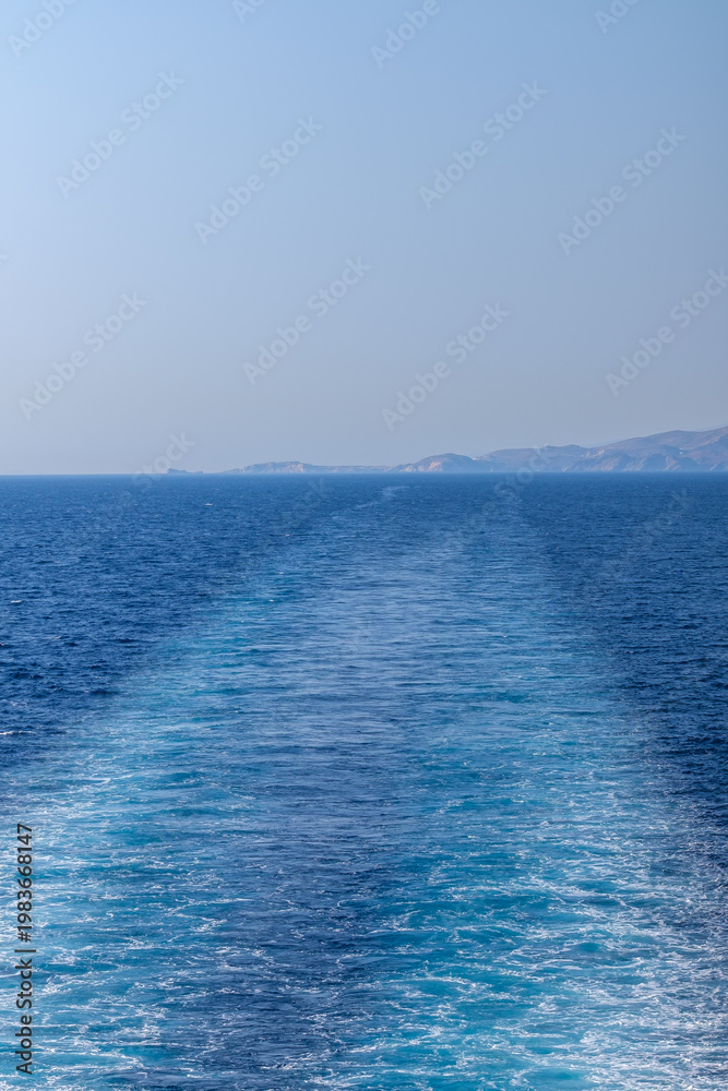 Fototapeta premium View of wave trails of a floating ferry boat at the Aegean Sea in Greece
