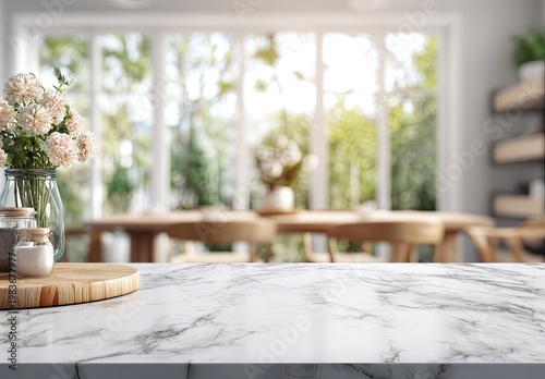 Empty Marble Table Top with Blurred Dining Room and Garden View Background.