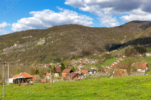 Wallpaper Mural Picturesque rural landscape in the Balkans with early spring blooms and mountain peaks Torontodigital.ca