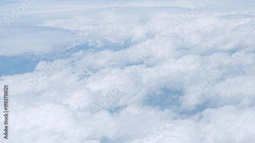 airplane window view cloudy sky