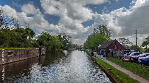 Canal boathouse along a peaceful towpath