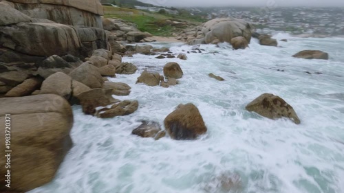 FPV Drone Cinematic Flight Over Camps Bay Beach Boulders and Crashing Waves, Twelve Apostles Mountains, Cape Town South Africa