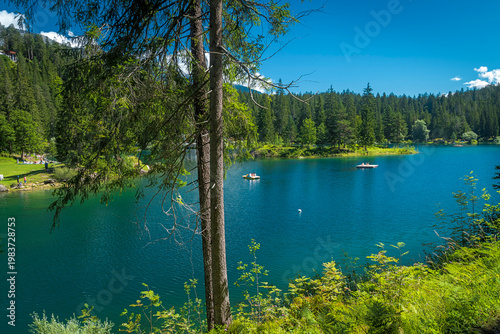 Caumasee turquoise alpine lake in Flims, Grisons, Switzerland