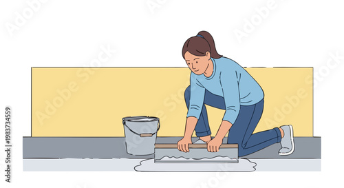 Woman leveling floor with trowel during home renovation project
