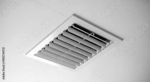 Ceiling air vent with slats recessed HVAC ventilation grille clean modern design white minimalist interior climate control system