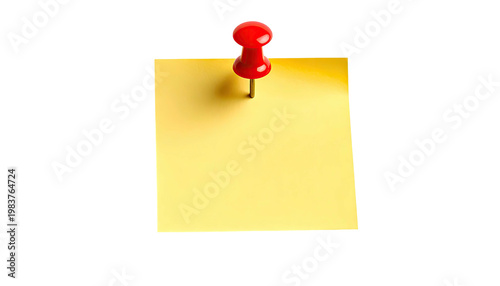 Yellow sticky note pinned with red pushpin providing vibrant contrast and a clear space for writing reminders against a stark backdrop