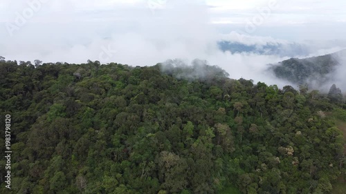 aerial shot, drones flying over a beautiful green mountains enter clouds zoom in, Cundimarca region in Colombia. Cloudy day 4K