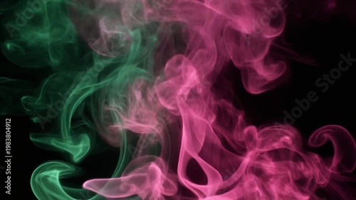 Colorful smoke swirling against black background