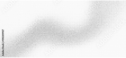 Halftone dots pattern with gradient effect on white background
