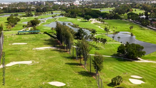 Miami Beach Golf Club which is a municipal course open to the public. Aerial drone video footage 2026