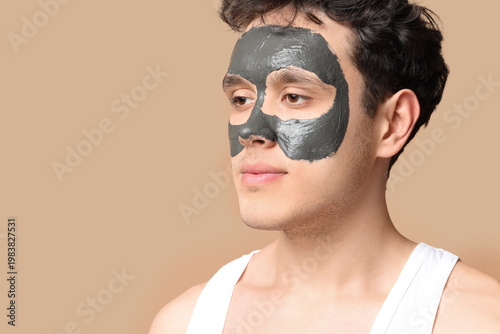Young man with applied faci...