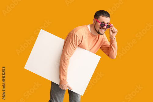Young man in sunglasses wit...