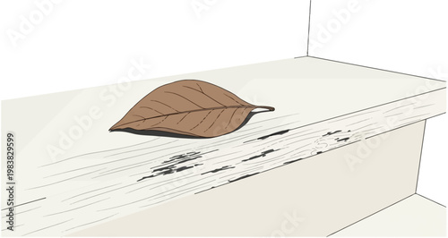 A dry brown leaf rests on a scratched, light-colored wooden surface, showing signs of wear and neglect.