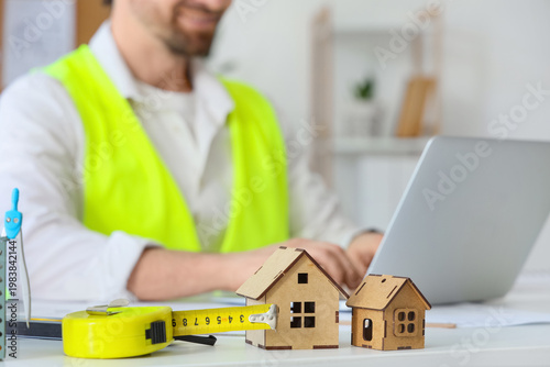 House models and tape measu...