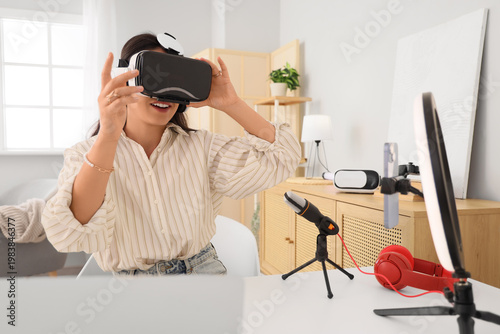 Female blogger in VR glasse...