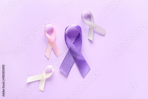 Colorful ribbons on lilac b...