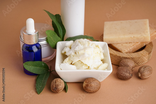 Bowl of shea butter, nuts a...