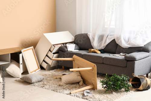 Canvastavla Interior of light living room with messed furniture after earthquake