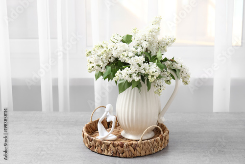 Vase with blossoming branch...