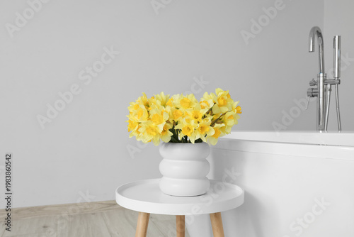 Beautiful vase with narciss...