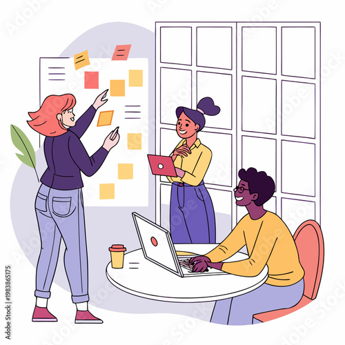 Three coworkers collaborating on a project