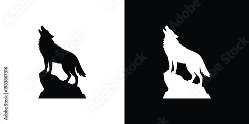 Black and white wolf silhouettes on rock formations