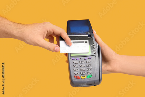 Male hand with credit card ...