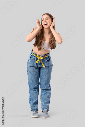 Pretty young woman in loose...