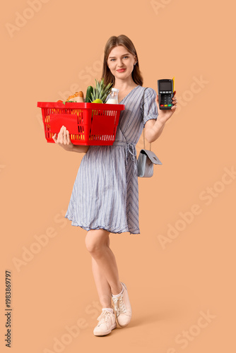 Young woman with full shopp...