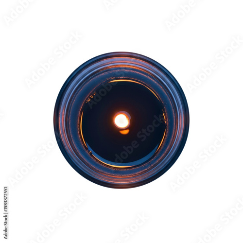 Top view of a lit candle in a glass jar