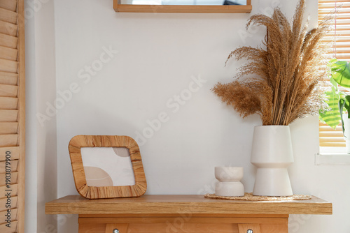 Vase with pampas grass and ...