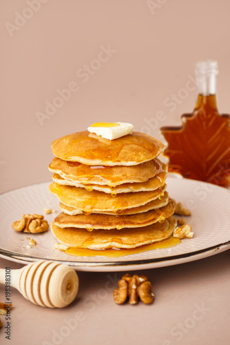 Plate of tasty pancakes wit...