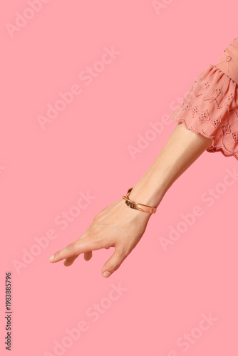 Woman with golden bracelet ...