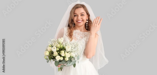 Happy bride in wedding dres...