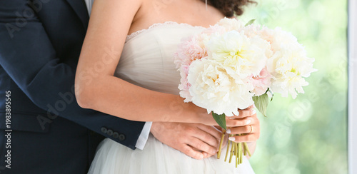 Young couple hugging on the...