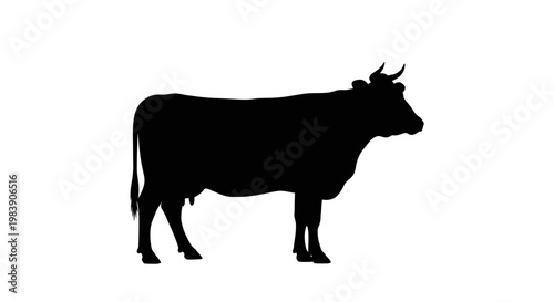 Black silhouette of a standing cow against a white background silhouette