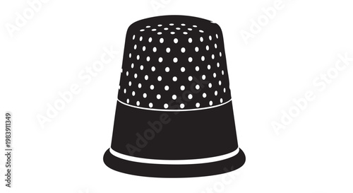 Sewing thimble in black and white polka dot pattern for crafting