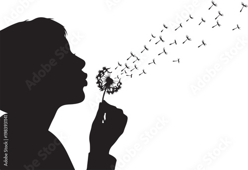 Silhouette of child blowing dandelion seeds