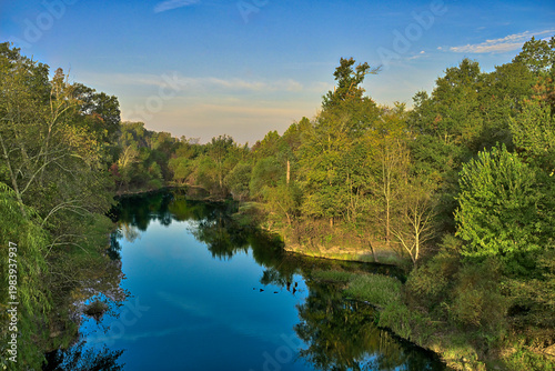 Calm river through trees in North Carolina
