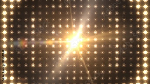 A bright wall of many lights shining with a bright, central, golden glow and sparkles