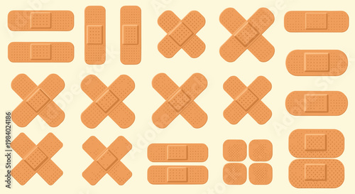 Large set of various shapes and sizes of adhesive bandages and plasters for medical first aid and wound protection.